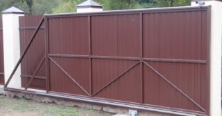 Купить откатные ворота из профнастила Каменск-Шахтинский, цена от 1780 руб.