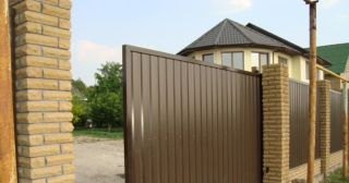 Купить откатные ворота из профнастила Каменск-Шахтинский, цена от 1780 руб.